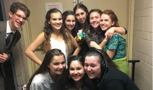 Pictured: Heather Kirschner (bottom left) and junior Josie Weinberg (top right) pose with castmates during Ovations Theaters December performance of Spring Awakening.