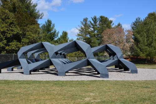 “Split Rocker” by Jeff Koons is an outdoor sculpture at the Glenstone Museum. In the spring and summer, it is covered with flowering plants. 