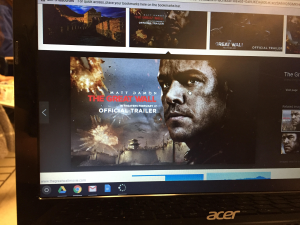 A movie poster of The Great Wall is seen on a CHS students screen.