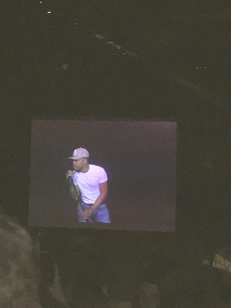 Dark lights illuminate Chance the Rapper who recently performed at Jiffy Lube Live.