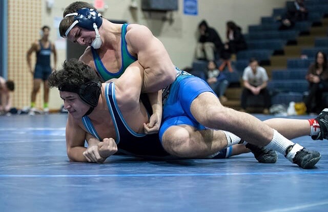 Wrestling team pins down record-breaking season - The Observer