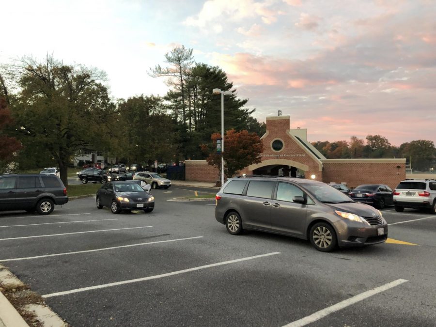 Cars pull into the stadium as part of the new initiative taken by the CHS administration for morning 