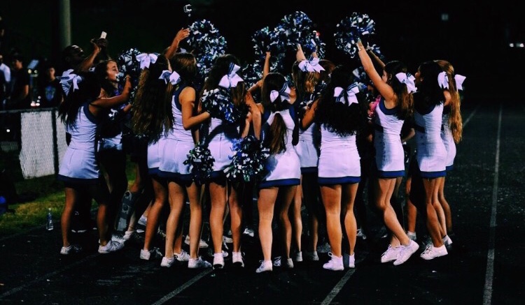 CHS Varsity Cheer performed a pyramid at a competition.