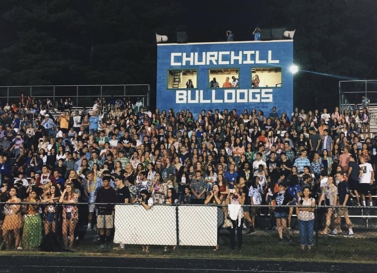 The+student+section+was+packed+with+students+from+all+grades+at+the+Sept.+21+football+game+against+Whitman+HS.+Students+donned+Hawaiian+attire+to+partake+in+the+themed+game.