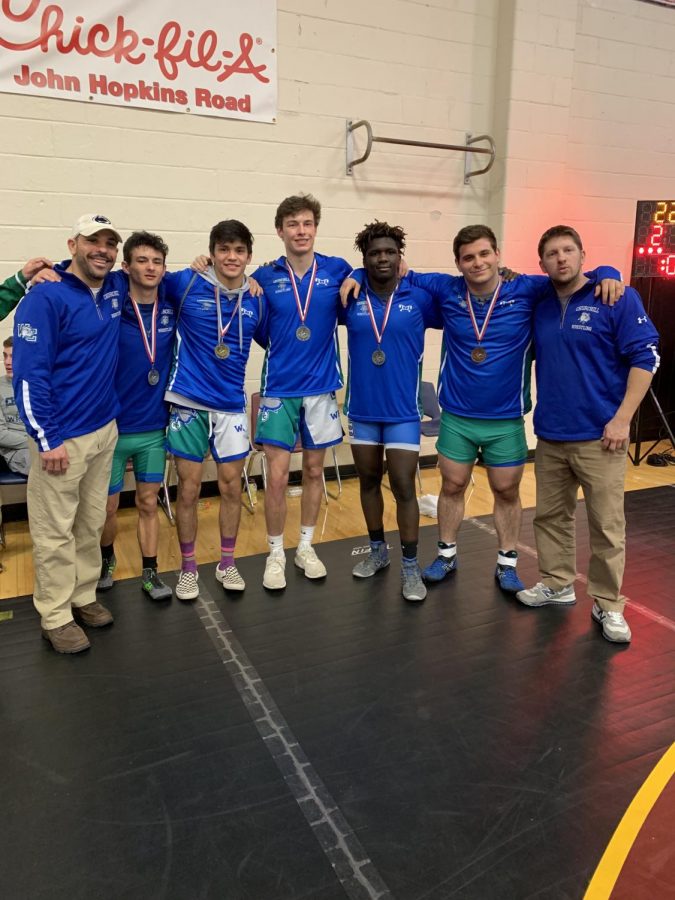 Senior Antony Slaughter,  senior Carlos Villamar. junior Parker Desalvio, junior Djamil Sarr and senior Ryan Kaplow pose after their tournament.