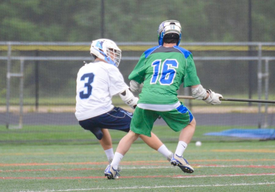 Senior Ian Rosenthal guards another player.