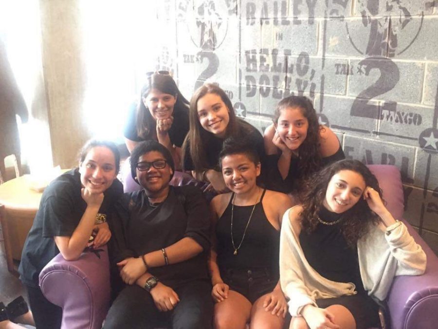 The WCHS slam poetry team poses after their 2017 competition with club sponsor, Christin Nixon, who also teaches English (top left).