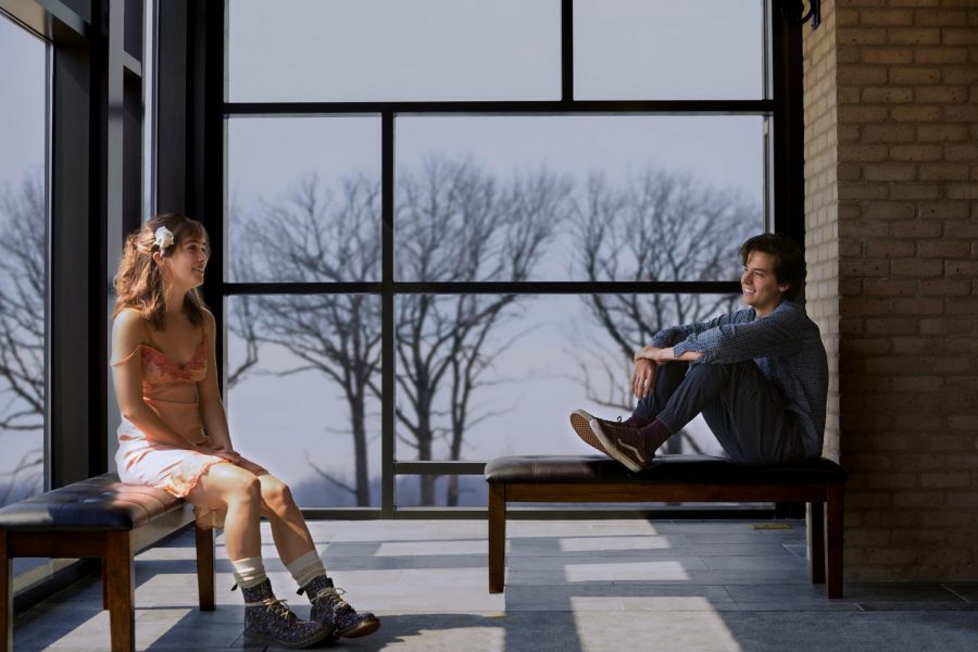 Haley Lu Richardson (left) and Cole Sprouse (right) portray two teens with a powerful connection in the romantic drama film Five Feet Apart. 