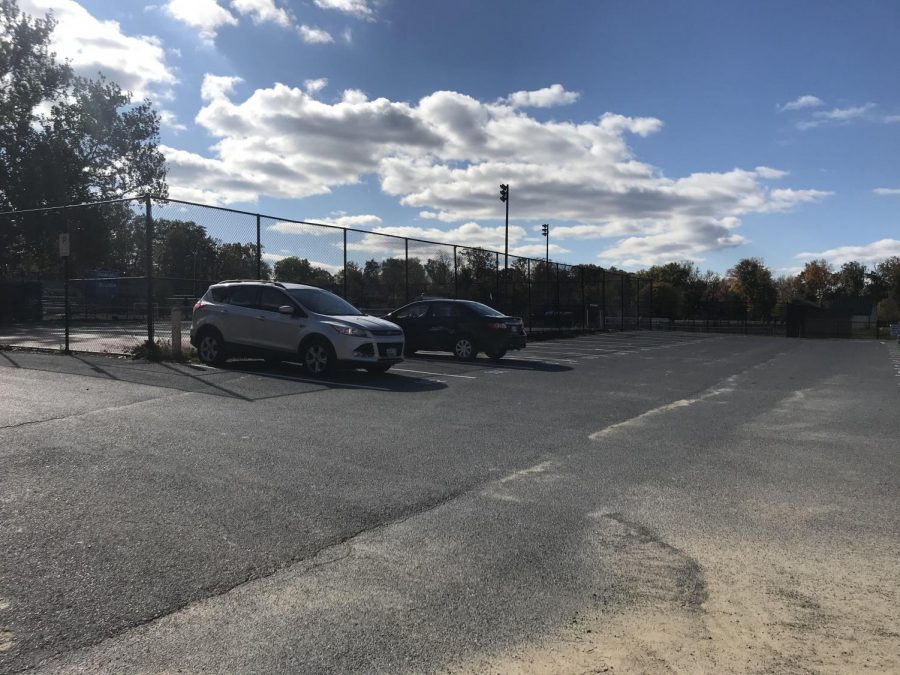 On Nov. 1, only two cars sit in the senior parking lot.  Nov. 1 2019 was senior skip day and very few seniors showed up to classes.