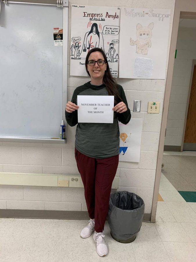 Blanken poses for a picture with her award. Blanken, an AP Psychology teacher, has been at WCHS for 13 years.