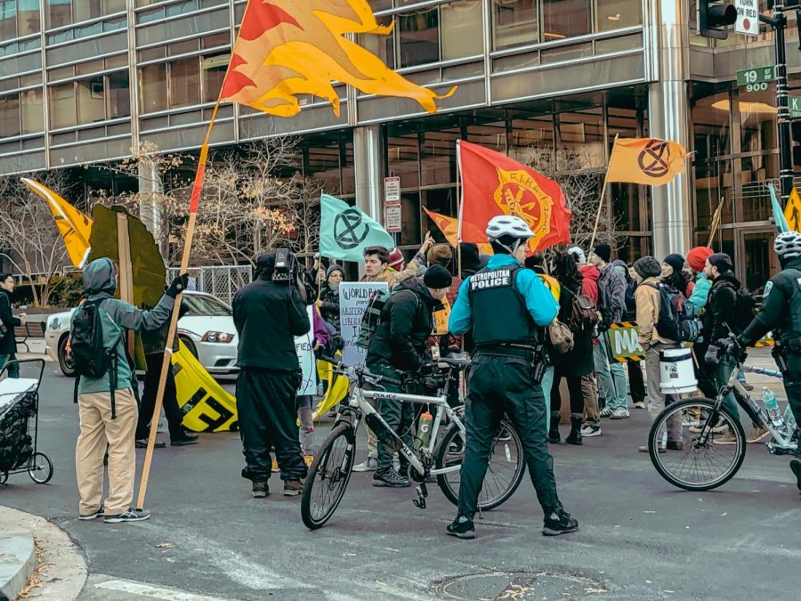 The organization Extinction Rebellion holds a climate strike outside the World Bank in Washington DC. Many students have become climate activists over the decade and attend these protests.