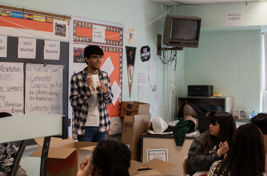 WCHS senior Robin Bali travels to Lakeland Elementary Middle School in Baltimore, Md. to deliver books and other supplies. In the photo, Bali is giving a presentation to students that attend Lakeland Elementary Middle School and is extremely grateful to be able to see their reactions.