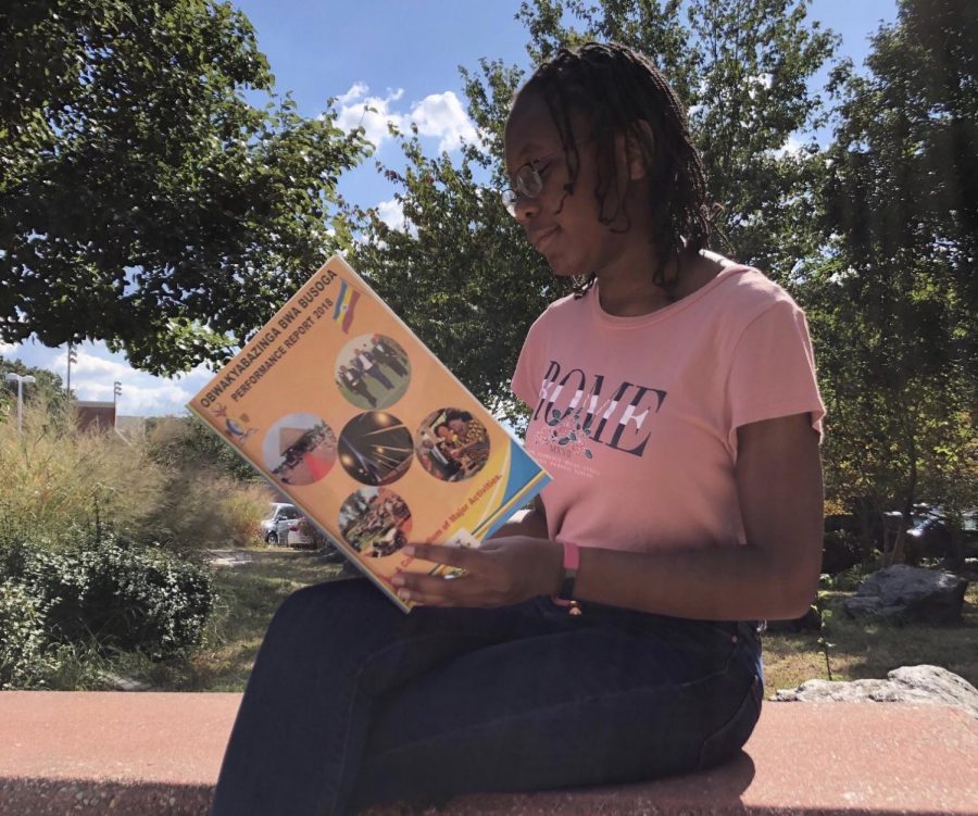 Queen Balina tells her story by posting this photo on the ISA Facebook page. She wants others to know how she feels about her culture, as shown by the book, and encourages others to share as well.
