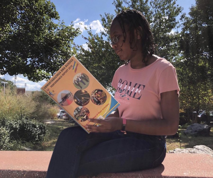 Queen Balina tells her story by posting this photo on the ISA Facebook page. She wants others to know how she feels about her culture, as shown by the book, and encourage others to share as well. 