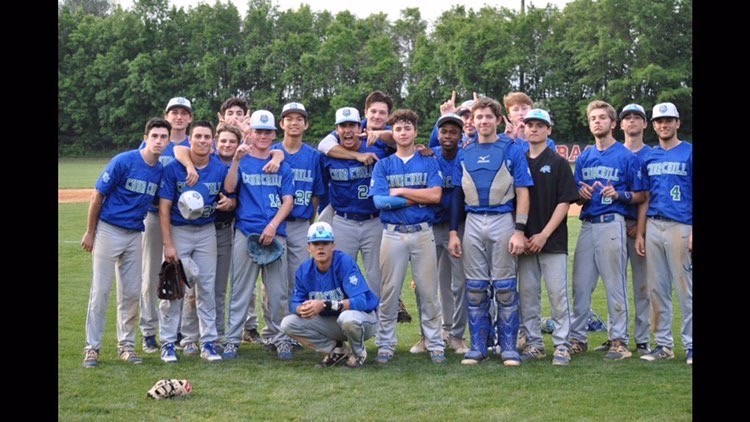 2019 WCHS baseball team posing for a squad pic after big win.