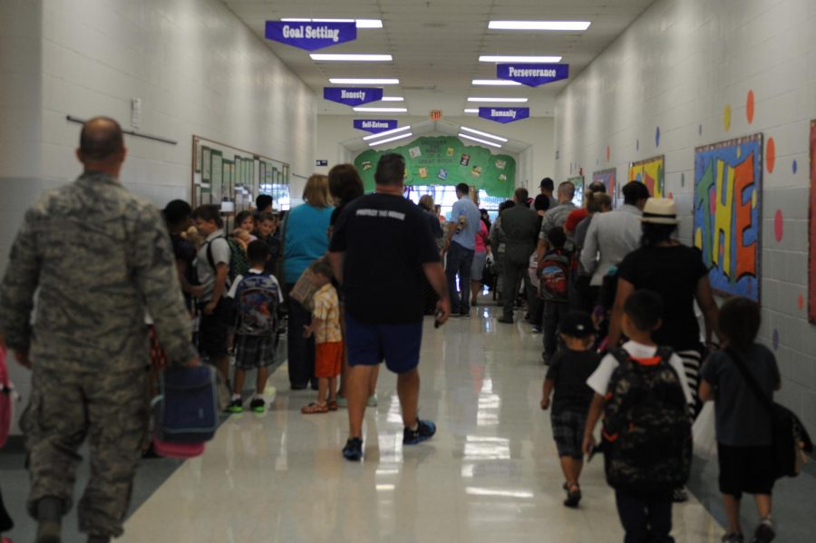 Students walk to their new classes after being given changed schedules for the new semester. At WCHS, this happens once a year.