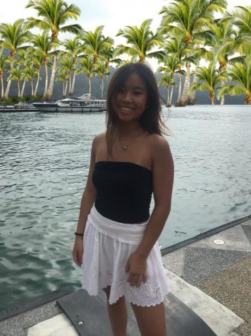 Kathy Hu poses in a tropical destination. Hu, along with many other members of the Class of 2020 were supposed to go on a Jamaica trip during the break.
