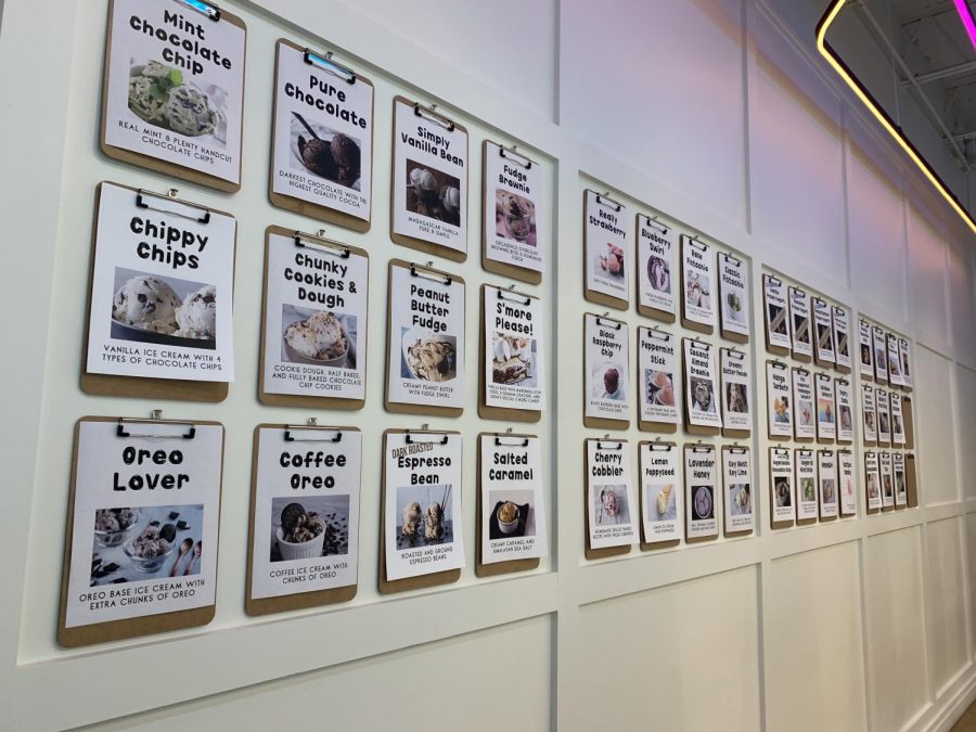 On the inside of Sarahs Handmade Ice Creams Wildwood shopping center location are photographs and descriptions of their flavors lining the entire wall. 