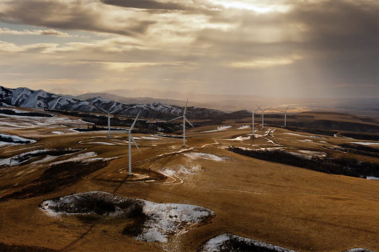 Wind farms like the one pictured are part of the future of clean energy. Soon, large corporations across the globe will use these to power stores, cell towers, and even homes.