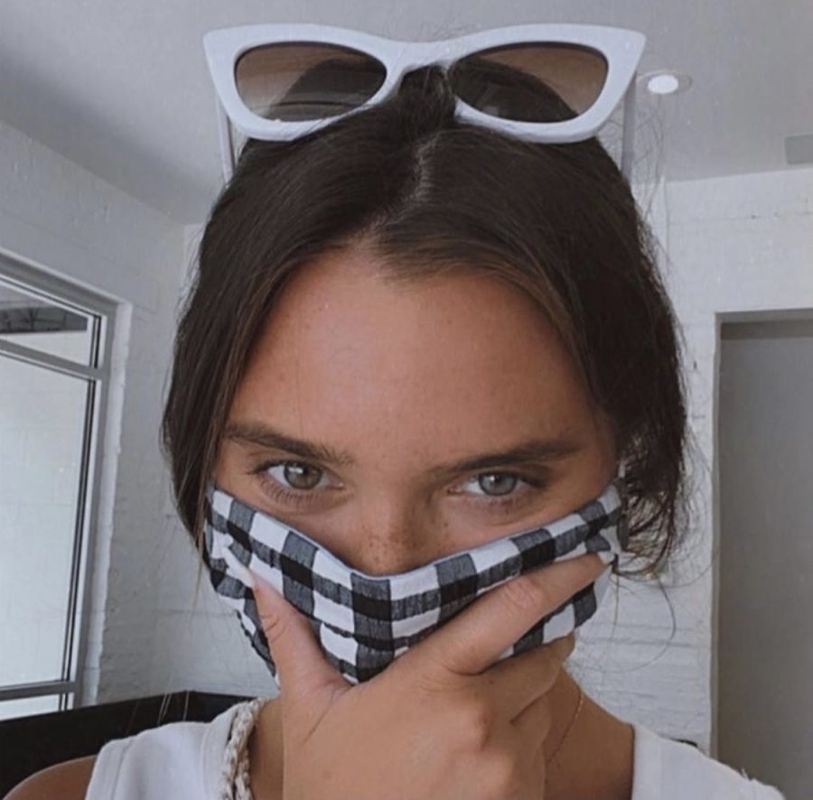 Social media influencer Hannah Meloche wears a mask made by student run Solidarity Masks. Wearing masks are necessary to stop the spread of COVID-19. 