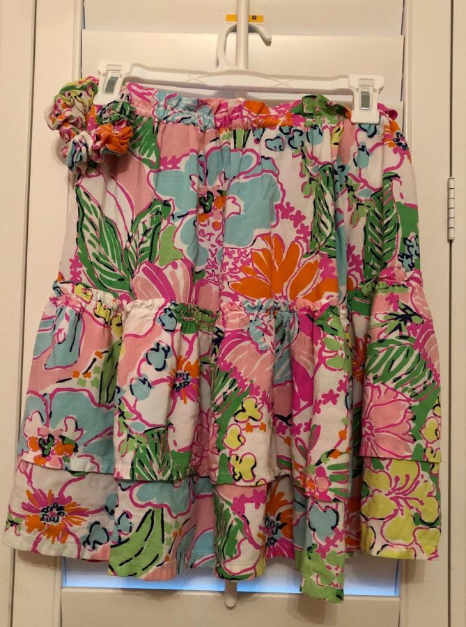 Sophomore Sydney Willich enjoys experimenting with bold and bright patterns, like she did while sewing this skirt and matching hair tie.