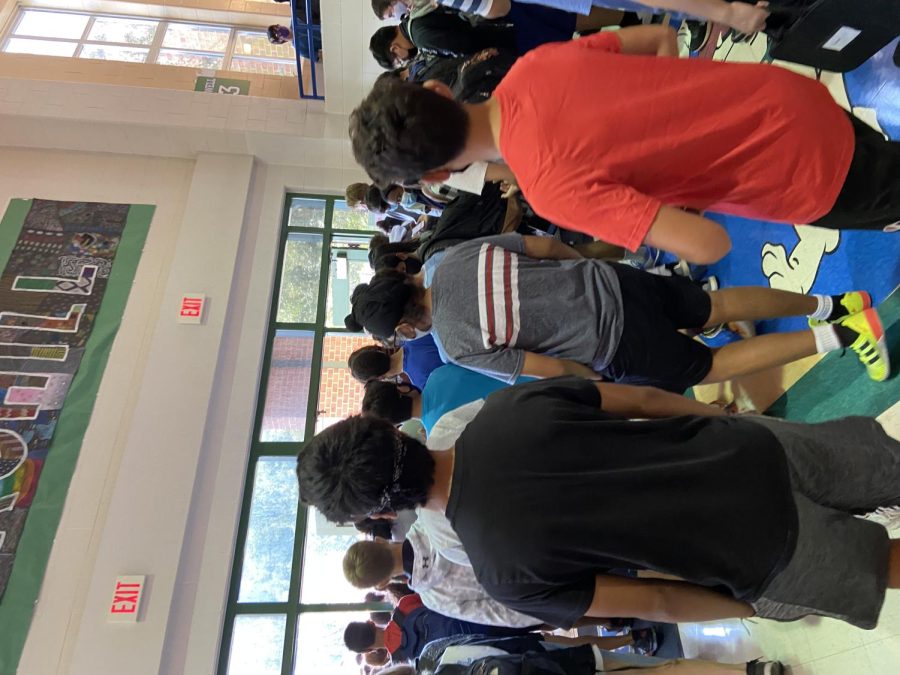 Students line up in the hallway, waiting to get out of the school. The end of school is one of the most risky times for students, as every student in the building lines up to go out the same few exits.