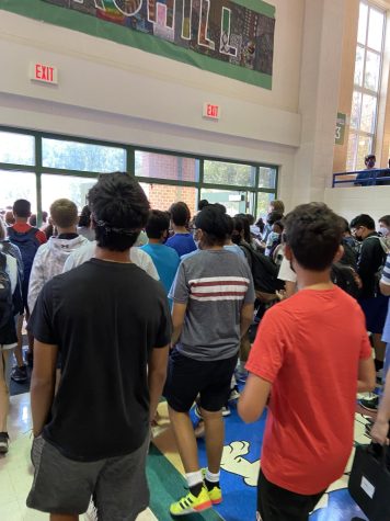 Students line up in the hallway, waiting to get out of the school. The end of school is one of the most risky times for students, as every student in the building lines up to go out the same few exits.