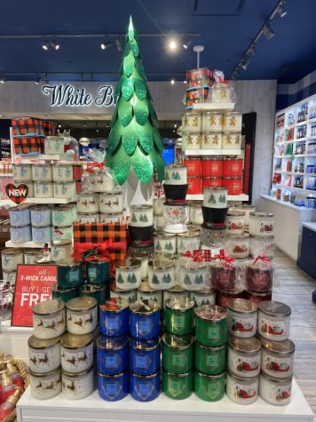 At Bath and Body Works, the holiday display, located in the front of the store, presents customers with some of their most popular candles for the holiday season. Bath and Body Works offers a wide variety of scents to choose from during this time of the year.