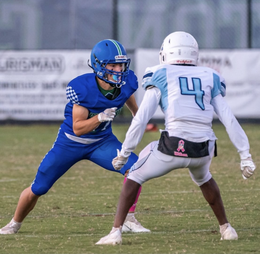 Although fans might see him in a basketball uniform now, just a few weeks ago Jamie Calhoun was catching passes for the WCHS football team. 