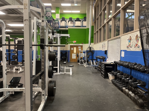 Squat racks (pictured left), free weights (pictured right) and treadmills (pictured above) are just a few of the many workout machines that are already available in the school weight room.
