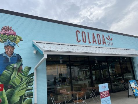 The outside of Colada Shop has many Cuban themed murals which immediately evoke the Cuban culture with the restaurant in Cabin John shopping center. 