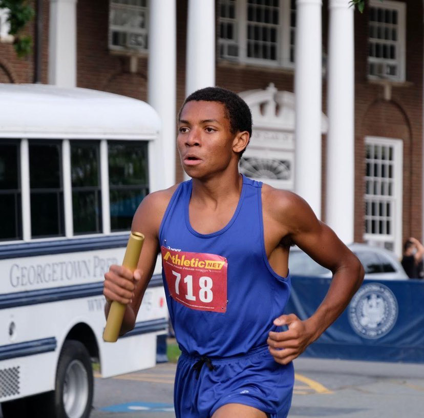 Senior Sebby Breton, running ahead of the competition at the Woodward Woodward Relays at Georgetown Prep on Sept. 4 2021 for a win.