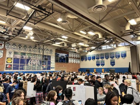 Hundreds of WCHS students crowd inside the gym on Sep. 16 for the annual Club day. With over 180 tables set up, many found it challenging to find their way around to each club.