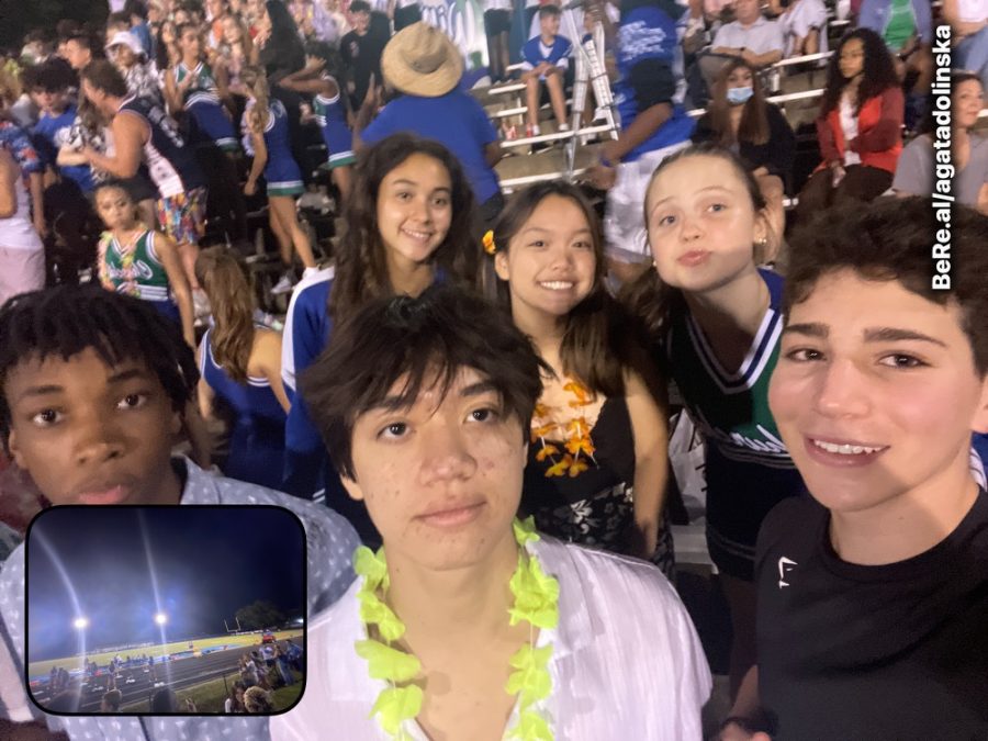 WCHS junior Agata Dolinska poses with her friends in the student section at the Blake vs. WCHS football game on September 9.  