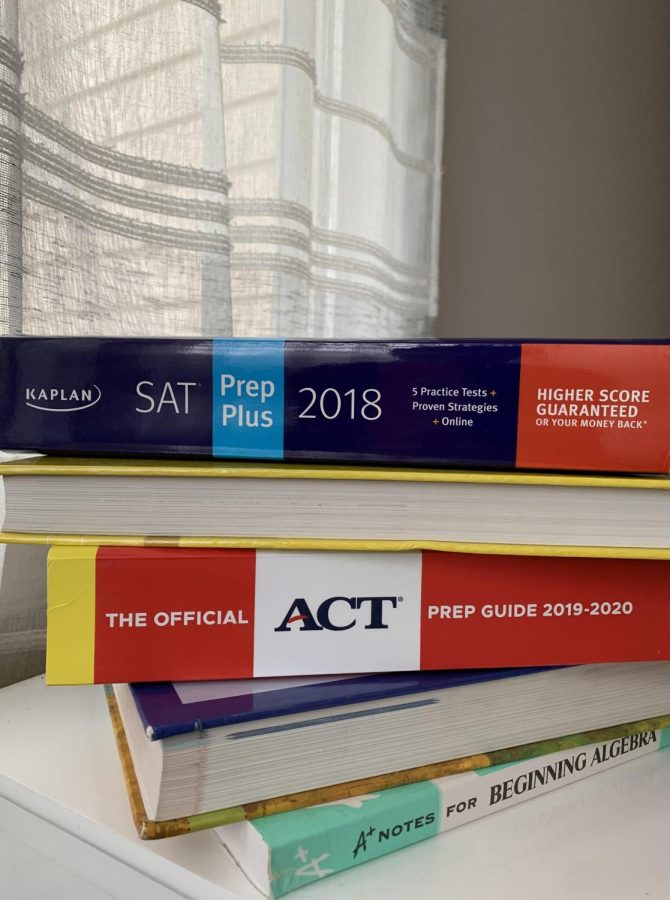 SAT+and+ACT+studying+resources+are+stacked+on+top+of+each+other+in+abundance%2C+on+Oct.+31%2C+2022.++Should+self-studying+be+the+major+form+of+preparation+for+these+standardized+tests%2C+or+should+high+schoolers+opt+for+paid+tutors%3F