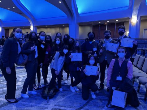 Members of the WCHS Model UN Club finish their annual NAIMUN conference with different awards for their hard work and dedication to think of ways to solve worldly problems.