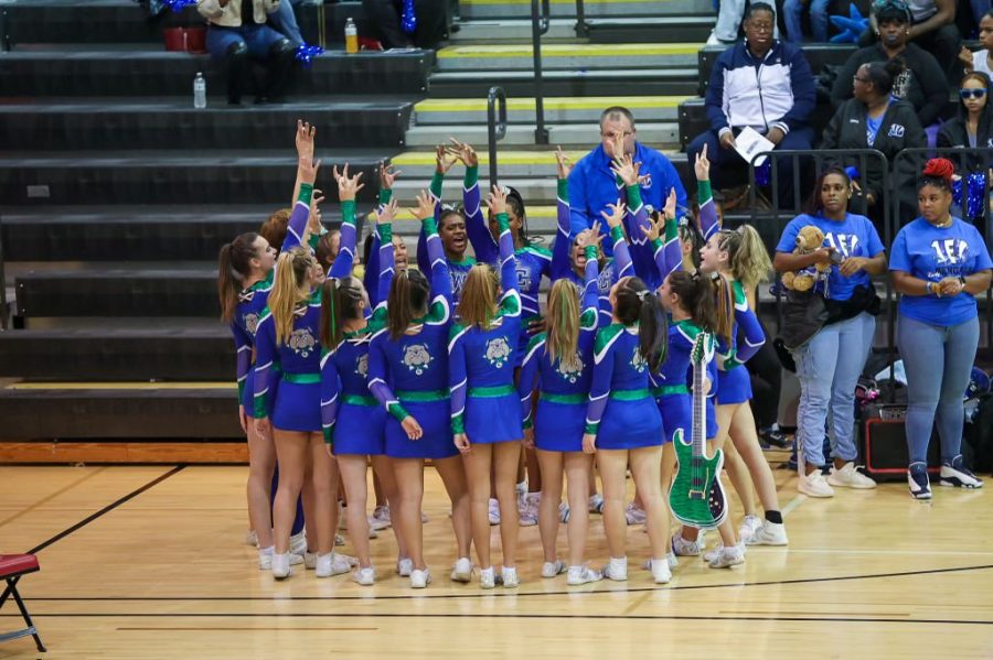 The+WCHS+varsity+cheer+team+ends+their+successful+performance+at+Counties+on+Oct.+28%2C+at+Montgomery+Blair+High+School.+