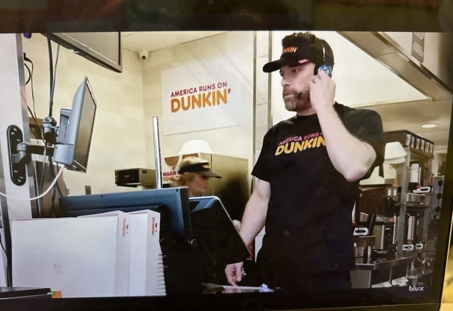 Ben Affleck is seen pretending to be a Dunkin’ Donuts employee in the 2023 Dunkin’ Donuts Super Bowl commercial. 