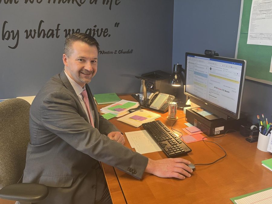 Mr. Taylor sitting at his desk completing work on Feb. 14. After being away from WCHS for over a month, Mr. Taylor has returned to his normal routine. 