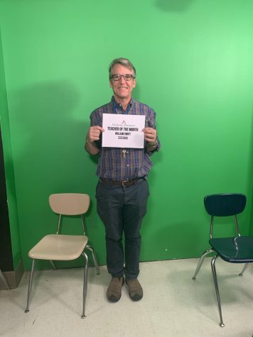 Mr. Swift proudly holds up his “Teacher of the Month” certificate. This is Swift’s third year at WCHS, where he teaches AP Computer Science Principles and Broadcast TV.
