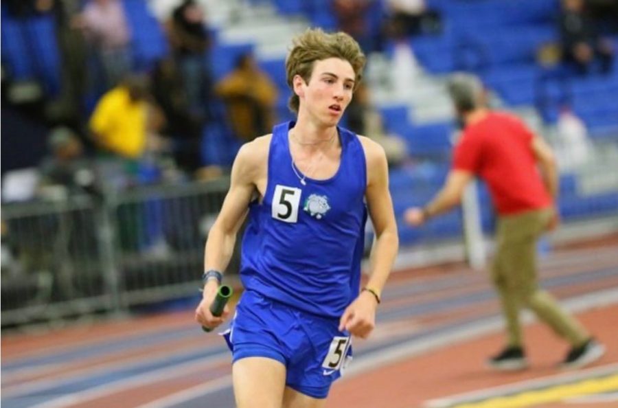 At PG sportsplex, Welby runs in the regional 4x400m.