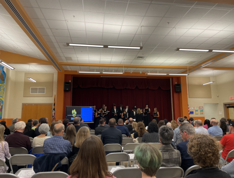 The Walt Whitman High School Chamber Choir directed by Michelle Kim performs The One Who Makes Peace song at the Montgomery County Jewish Educators Alliance (MCJEA) Holocaust Remembrance event. 