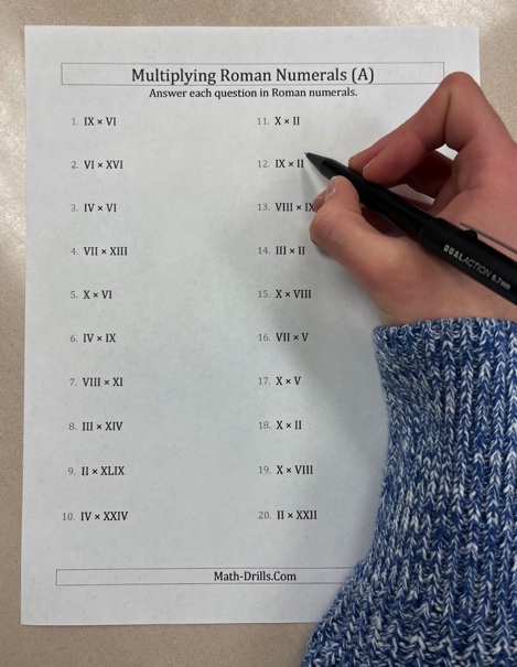 WCHS+students+begin+adjusting+to+solving+mathematical+problems+with+Roman+numerals+as+the+school+implements+RNT.