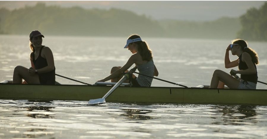 DCNRC Girls, including freshman Corinne Davies, pause for a moment mid-practice on the beautiful Potomac River.