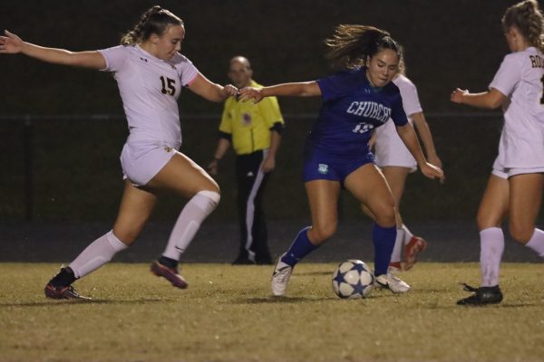 On Oct. 6, 2022, WCHS Athlete Rosa Saavedra dribbles ahead of a player from Urbana. The Girls Varsity Team had a successful run during the 2022-2023 school year until  their fall against WWHS.