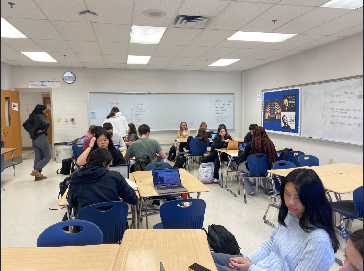 The eighth period yearbook class is seen brainstorming, compiling, and designing the pages that make up the fall spreads of the WCHS Finest Hours yearbook on Oct. 25, 2023.