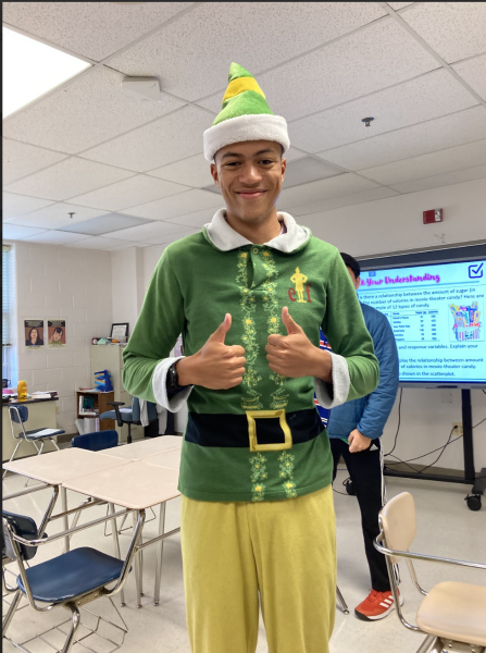 WCHS senior Andrew Ashton, one of the few who participated in spirit week at WCHS, shows off his spirit by wearing elf pajamas during Homecoming Spirit Week. Themes included Pajama Day, Anything But a Backpack Day, and USA Day.  