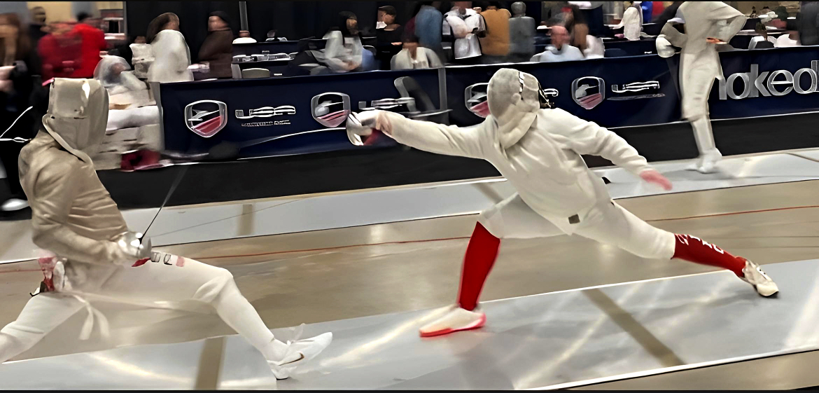 WCHS junior Aydan Lee (on the left) makes his opponent fall short from lunging. Lunging is one of the most commonly used form of attack in fencing. Only skilled fencers will know how to properly be defensive and make their opponent fall short. 