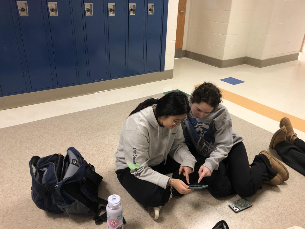 WCHS student Thao Nguyen reviews French on Duolingo while at lunch. Taking the biliteracy exam helped Nguyen understand her French skills and work to better them.