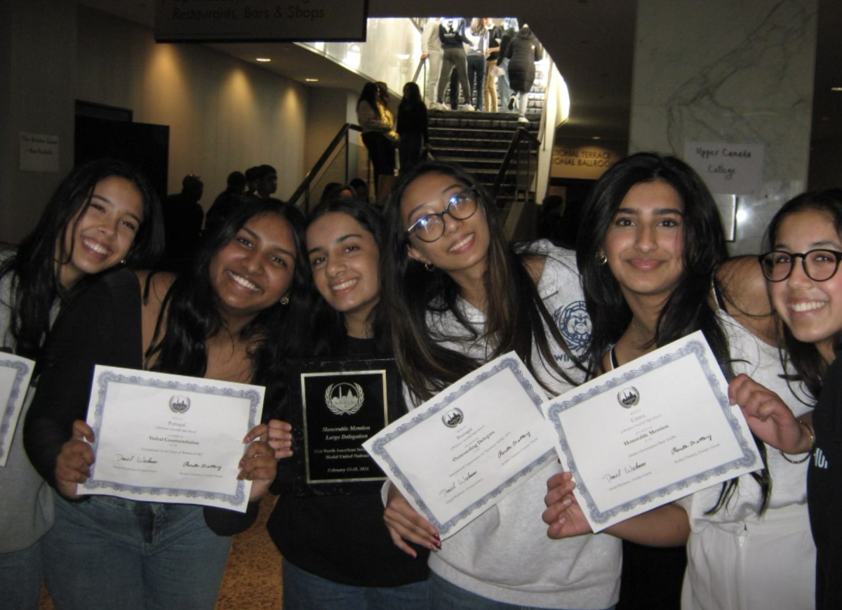 From left, WCHS students Mira Wedam, Sneha David, Pavania Durbhakula, Anjali Tatavarthy, Anchal Sharma and Riya Wedam pose on the last day of the four-day conference for a congratulatory photo, holding their respective awards.